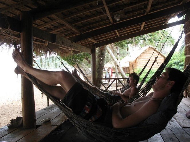 Relaxing in Hammocks on Beach in Cambodia.  Koh Ru (Bamboo Island)